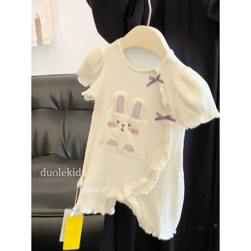 Baby girl summer cartoon romper by Nova Mart, short sleeve climbing jumpsuit with colorful playful design for warm weather.