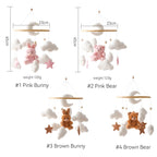 Wooden crib mobile by Nova Mart featuring a soft felt cartoon bear and a music box, designed for baby cribs.