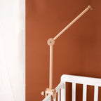 Wooden baby crib mobile with cloud-shaped hanging rattle toy and bracket, designed for soothing baby sleep and entertainment.