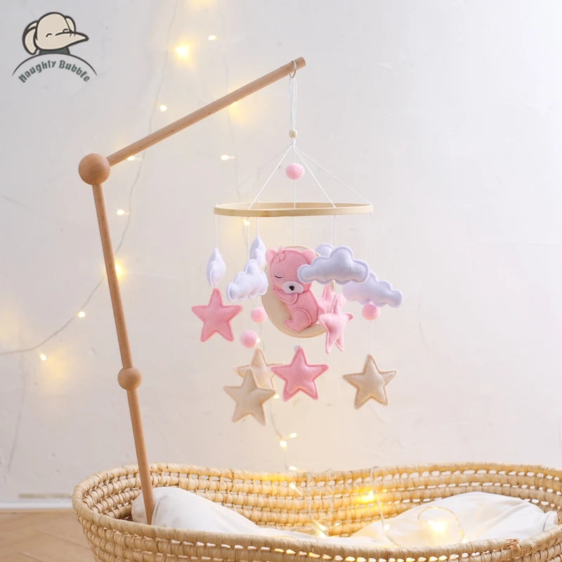 Wooden baby mobile and crib bell rattle toy by Nova Mart, featuring a music box for newborns and infants up to 12 months.