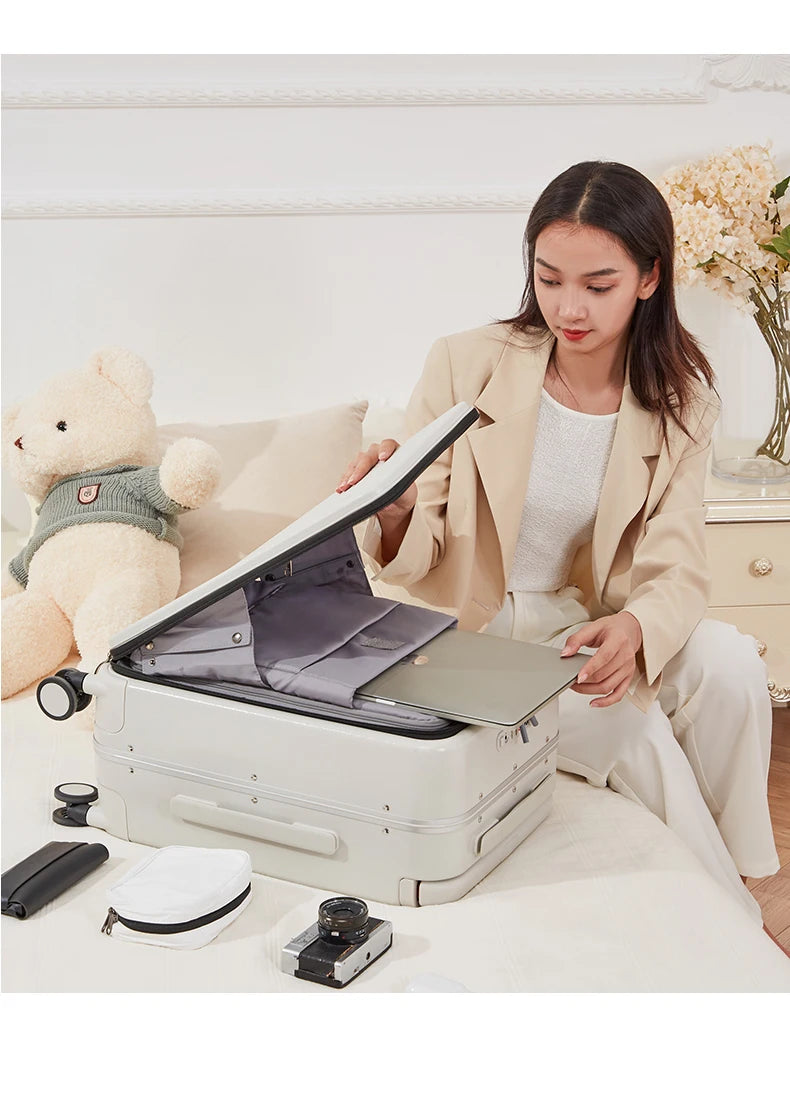 Nova Mart Mixi PC aluminum frame trolley case with laptop pocket, lightweight luggage with secure handle and spacious interior.