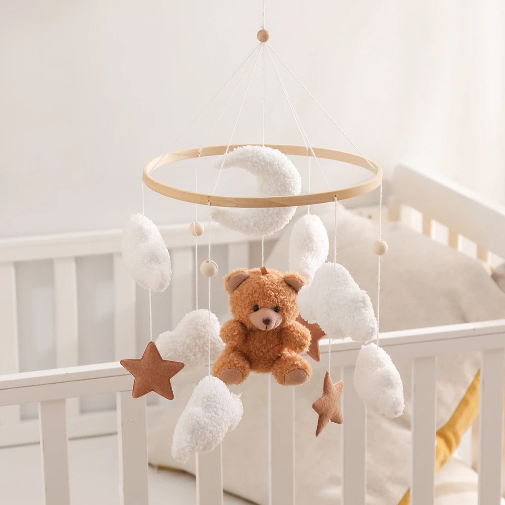 Wooden baby crib mobile by Nova Mart featuring a soft felt cartoon bear and music box for soothing bedtime decor.