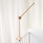 Baby wooden cloud-shaped crib mobile with hanging rattles and toy bracket by Nova Mart, designed to entertain and soothe infants.