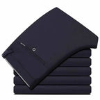 Men's slim fit black suit pants from Nova Mart, formal trousers with a tailored fit and classic design, shown on a hanger.