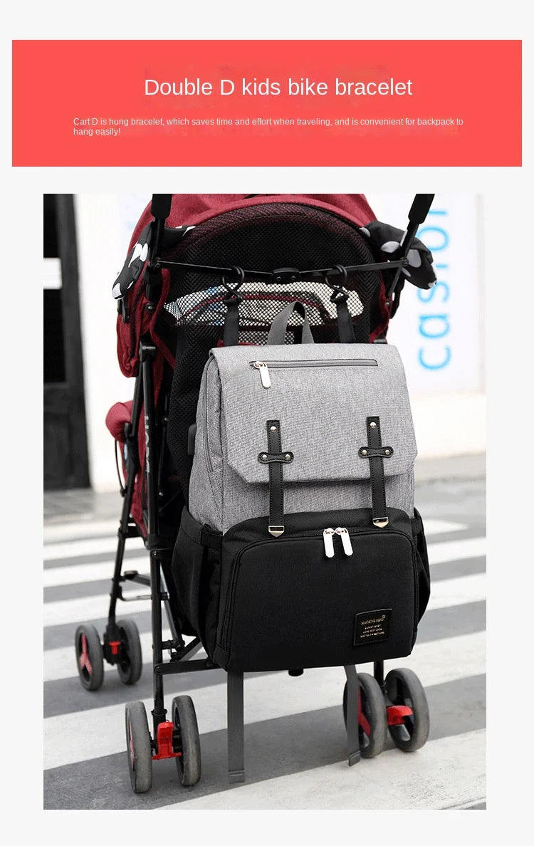 Nova Mart denim baby diaper bag backpack with thermal bottle pocket, featuring multiple compartments and adjustable straps.