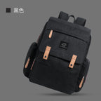 Denim Nova Mart diaper bag backpack with thermal bottle pocket, featuring multiple compartments and adjustable straps for parents.