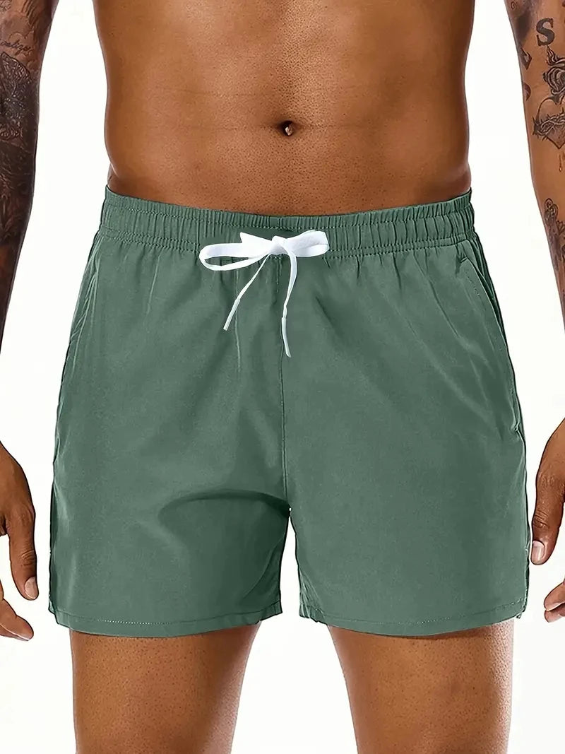 Men's beach sports shorts with elastic waist and double pockets, ideal for summer, by Nova Mart.