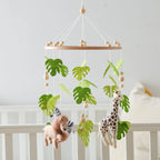 Wooden wind chime baby crib mobile with animal felt dolls and music, designed for gentle visual and auditory stimulation.