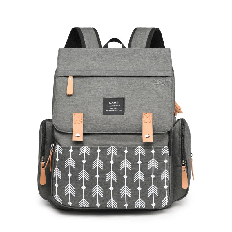 Nova Mart denim baby diaper bag backpack with thermal bottle pocket, stylish and functional for parents on the go.