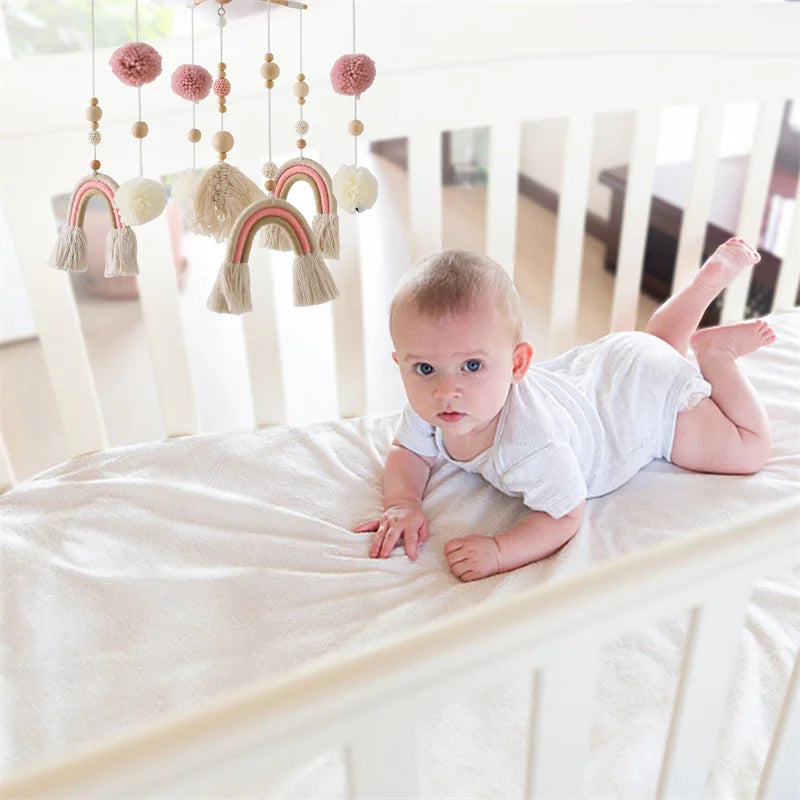 Wooden baby crib mobile with felt animal dolls and musical chime, designed as a baby toy by Nova Mart.
