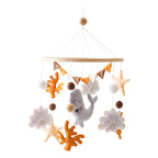Wooden baby mobile by Nova Mart featuring a soft felt cartoon bear and music box for infants.