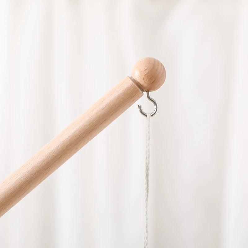 Wooden baby crib rattle toy with crochet bed bell bracket for infants 0-12 months, perfect for gentle soothing and entertainment.