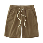 Men's waffle texture casual shorts by Nova Mart with a loose fit and drawstring waist, perfect for summer wear.