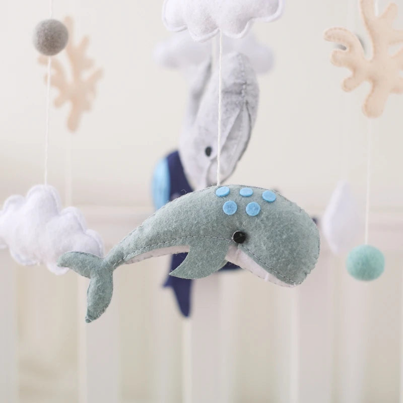 Wooden crochet star baby crib mobile with bed bell rattle toy by Nova Mart, featuring handcrafted stars and soft, colorful details.