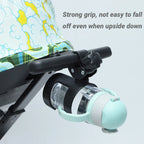 Universal baby stroller cup holder from Nova Mart holding a bottle and drink, attaches securely to stroller handle.