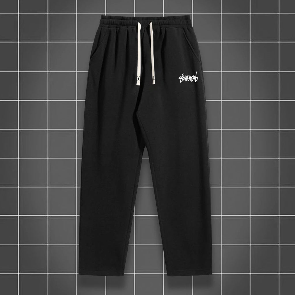 Men's solid color straight leg jogging pants by Nova Mart, casual sportswear, shown in a relaxed fit with a focus on fabric and design.