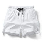 Men's beach sports shorts with elastic waist and double pockets, summer casual fashion by Nova Mart.