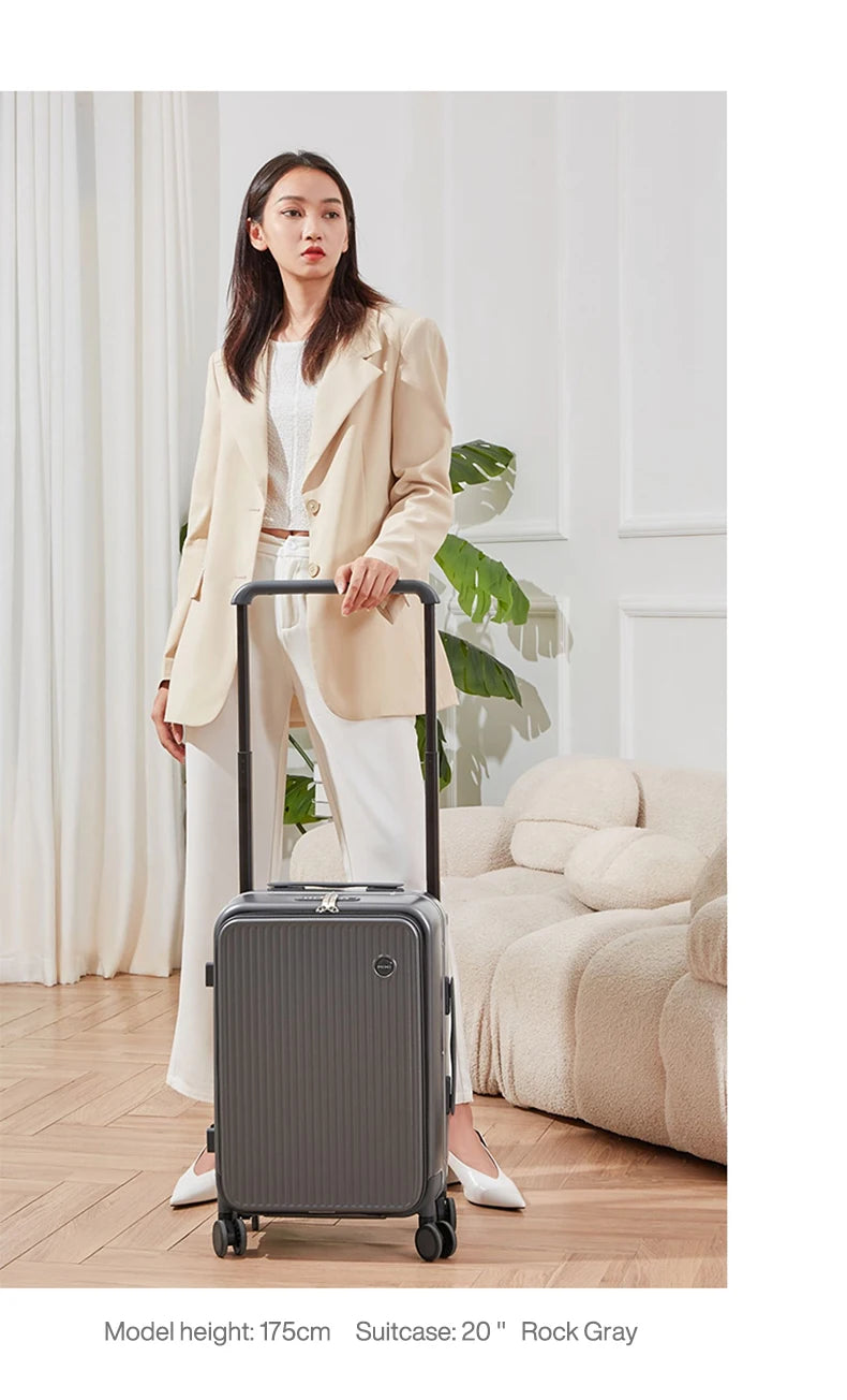 Nova Mart Mixi PC aluminum frame trolley case with laptop pocket, durable luggage with sleek design and sturdy handles.