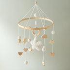 Wooden crochet star baby crib mobile with bell and rattle, Nova Mart baby toy for soothing and entertainment.