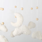 Neutral nursery felt baby mobile featuring boucle clouds and moon shapes, designed by Nova Mart for soothing baby toys.