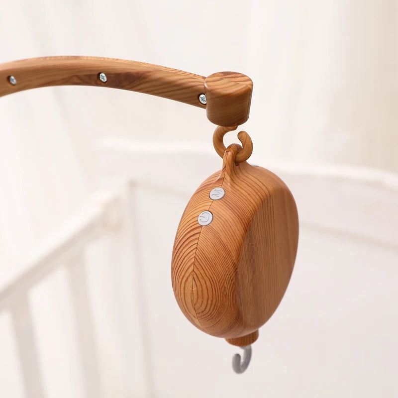 Nova Mart DIY baby crib bed bell holder arm with rotating music box, featuring colorful toy and easy-to-attach design for infants.