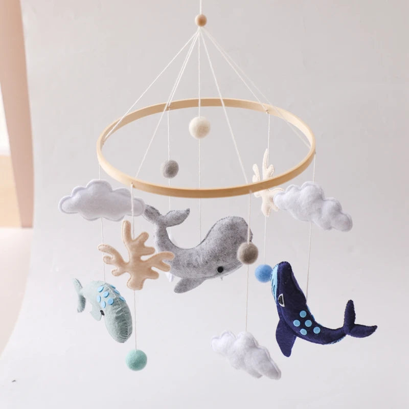 Wooden crochet star baby crib mobile with bell and rattle toy by Nova Mart, perfect for soothing and entertaining infants.
