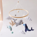 Wooden crochet star baby crib mobile with bell and rattle toy by Nova Mart, perfect for soothing and entertaining infants.