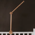 Baby wooden crib mobile by Nova Mart featuring cloud-shaped hanging rattle toy and bracket for easy attachment to crib.