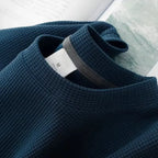 Unisex waffle knit T-shirt in solid color, casual men's fashion by Nova Mart, shown in a relaxed, loose fit style.