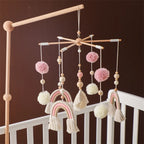 Wooden baby crib mobile with animal felt dolls and music from Nova Mart, designed as a charming baby toy for nursery decor.