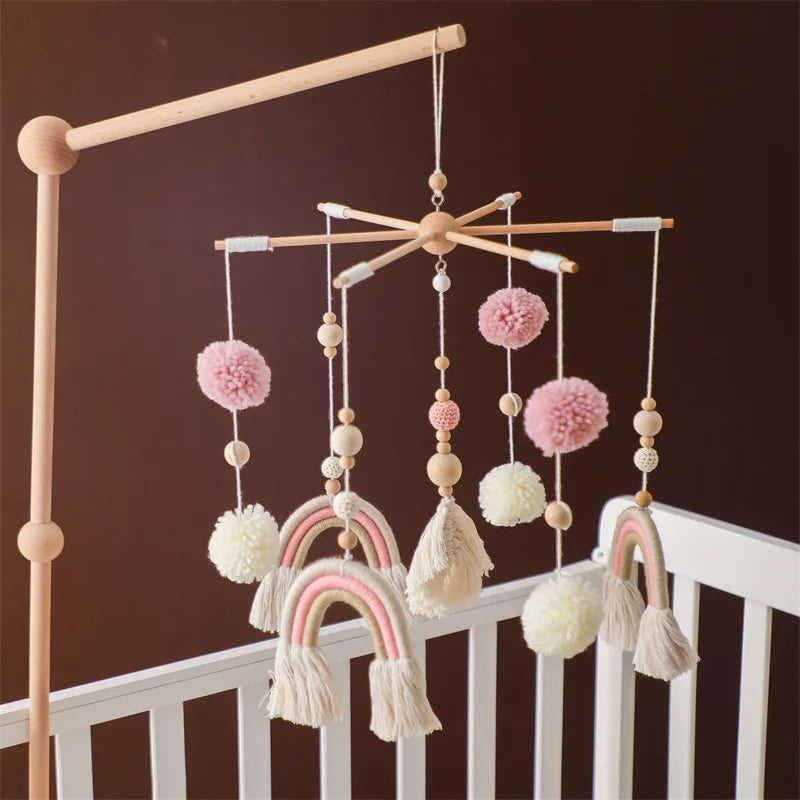 Wooden baby crib mobile with animal felt dolls and music from Nova Mart, designed as a charming baby toy for nursery decor.