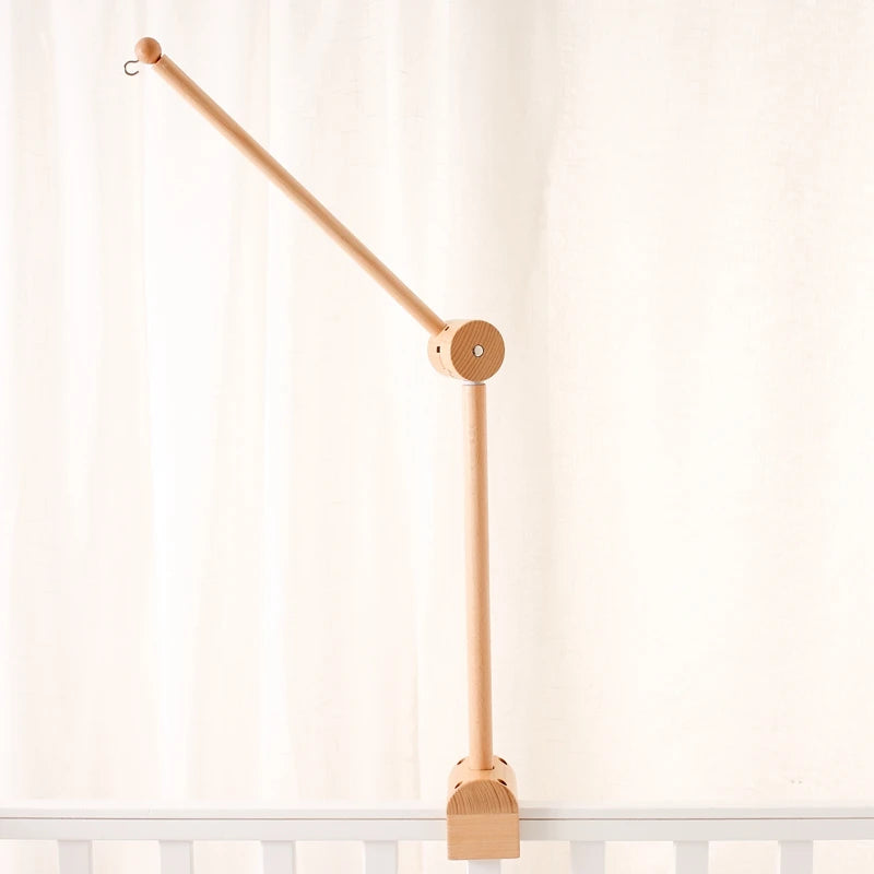 Baby wooden crib mobile with cloud-shaped hanging rattle toy bracket by Nova Mart, designed for soothing nursery decor.