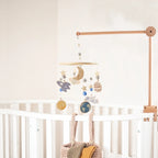 Baby wooden crib mobile by Nova Mart with cloud-shaped hanging rattle toy and bracket for crib decoration.
