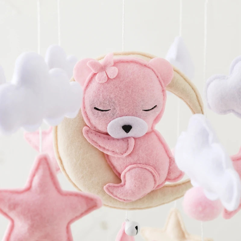Wooden baby mobile and crib bell rattle toy from Nova Mart, featuring a music box design for newborns and infants 0-12 months.