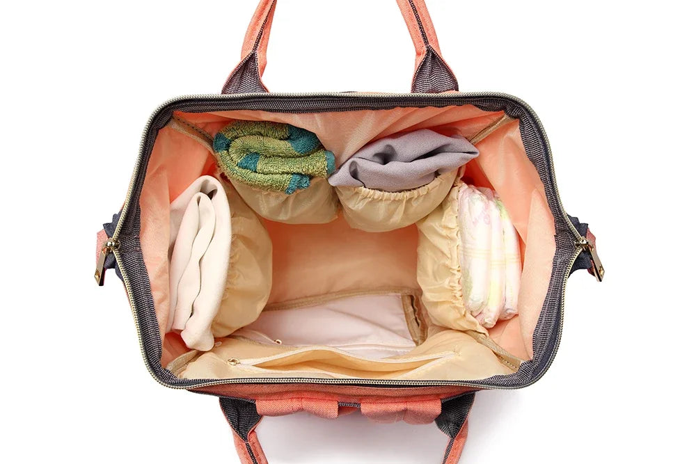 Large capacity Lequeen mummy diaper bag backpack by Nova Mart with multiple compartments for travel and baby essentials.
