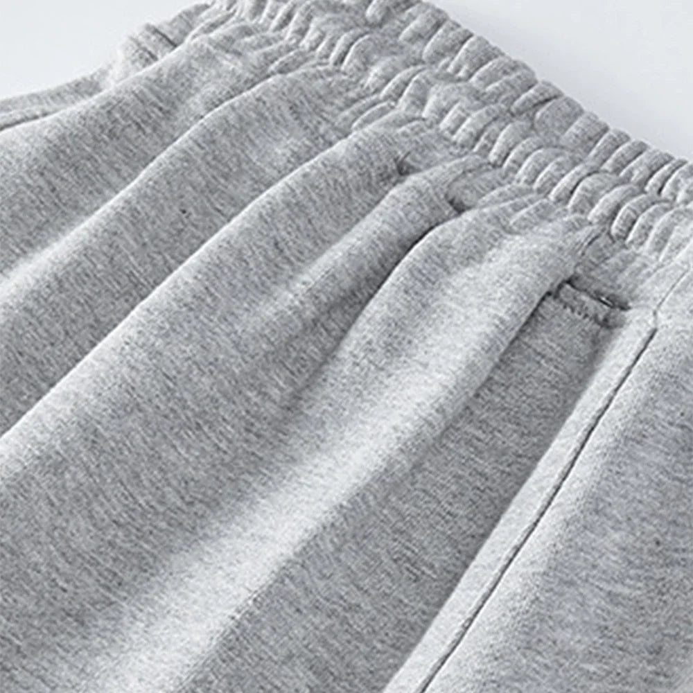 Men's casual drawstring jogger shorts by Nova Mart, showing comfortable black sweat shorts with elastic waistband and side pockets.