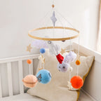 Wooden baby crib mobile by Nova Mart with animal felt dolls and hanging musical wind chime for infants.