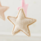 Wooden baby mobile and crib bell rattle toy from Nova Mart with colorful hanging toys and a music box for newborns.
