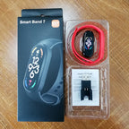 Nova Mart M7 Smart Band with heart rate monitor and fitness tracker, showing varied watch dials on a sleek digital display.