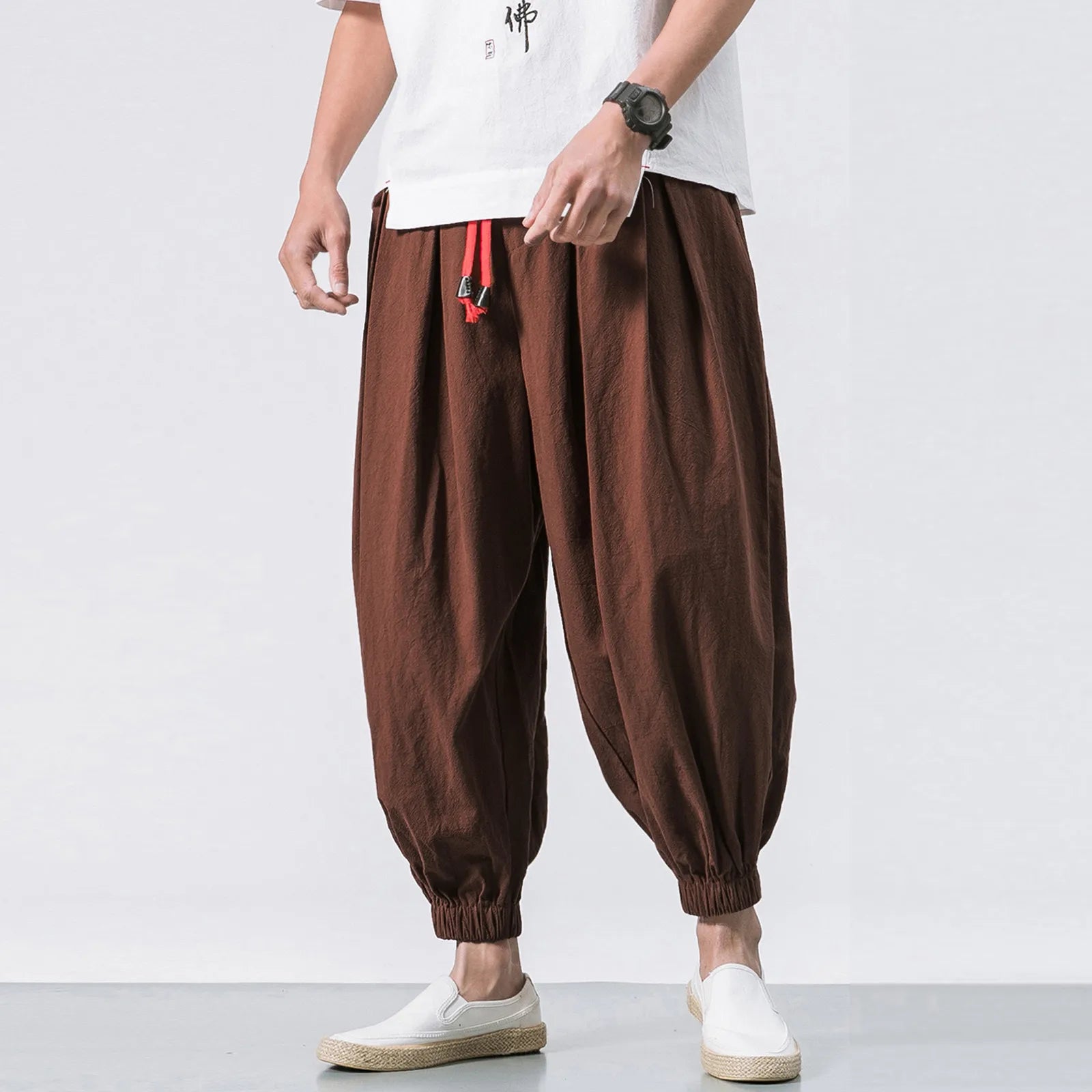 Men's oversize loose linen harem pants by Nova Mart, showing relaxed fit and lightweight fabric in natural linen color.