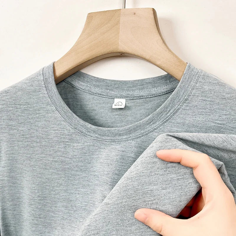 Men's casual cotton round neck T-shirt by Nova Mart, featuring a simple design and comfortable fit.
