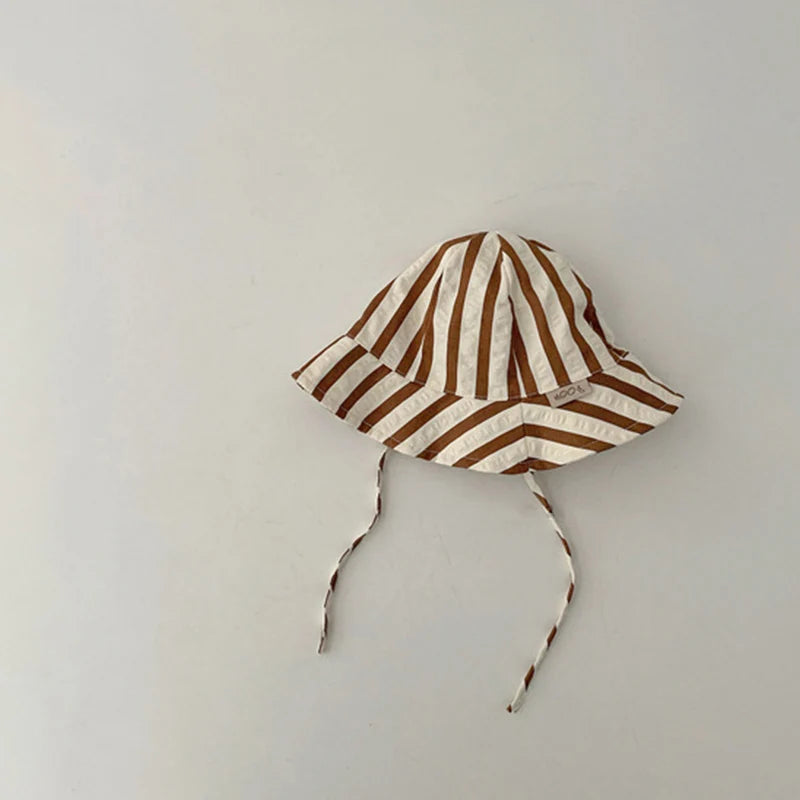 Baby bucket hat by Nova Mart, sunshade fisherman cap for infants and toddlers, lightweight and protective for sunny days.