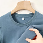 Men's Korean casual cotton round neck T-shirt by Nova Mart, shown in white with a simple, classic fit and soft fabric.
