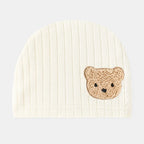 Nova Mart baby clothing: 100% cotton newborn romper with cartoon bear design and matching hat, soft and comfortable for infants.
