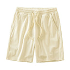 Men's navy waffle texture shorts with loose fit and drawstring waist, ideal for casual summer wear by Nova Mart.
