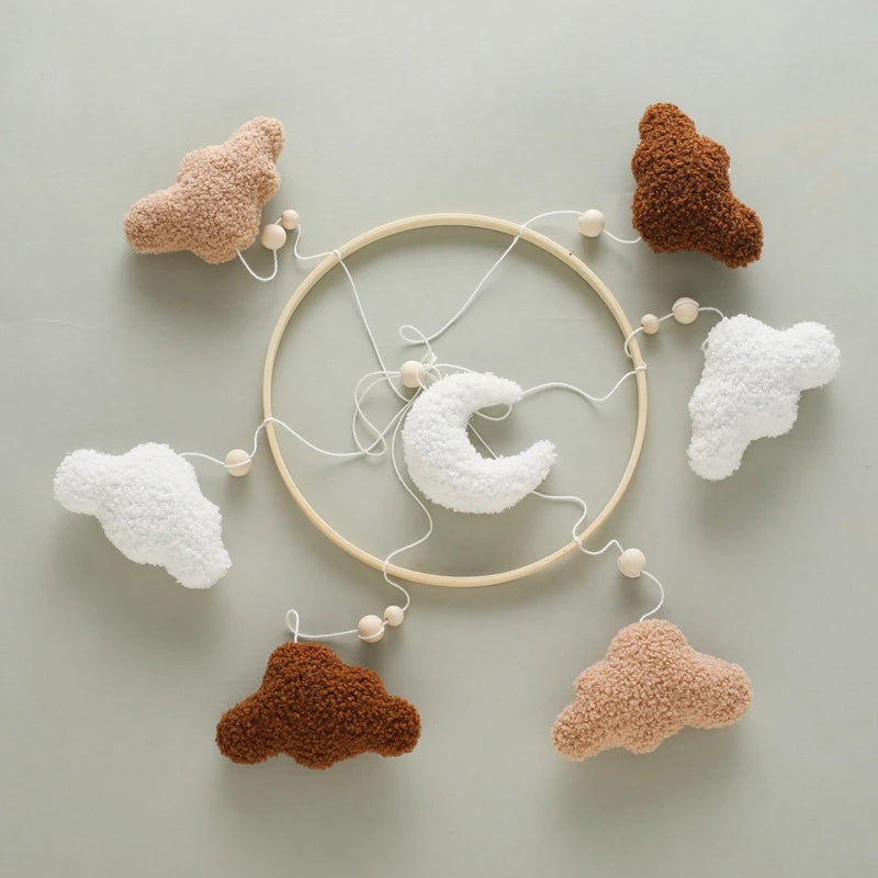 Wooden crochet star baby crib mobile with bell and rattle toy by Nova Mart, featuring adorable stars for soothing nursery decor.