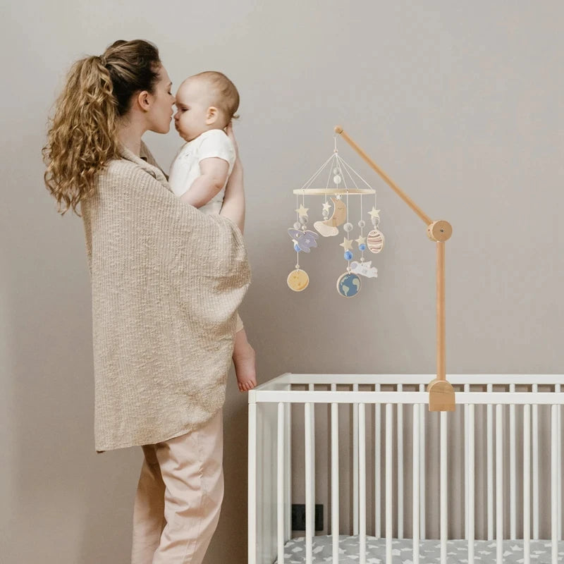Wooden baby crib rattle toy with crochet bed bell bracket for infants 0-12 months, by Nova Mart, soft and safe baby toy.