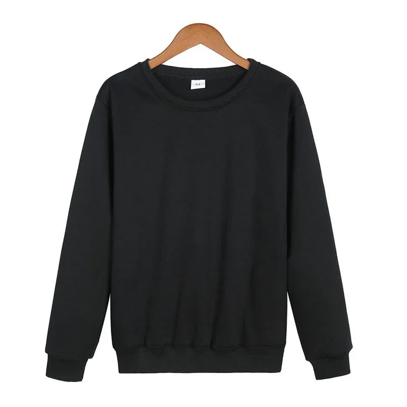 Men's solid color casual hoodie by Nova Mart, autumn streetwear pullover, front view showing soft fabric and relaxed fit.