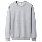 Men's solid color casual hoodie by Nova Mart featuring a relaxed fit and autumn streetwear style, displayed in a neutral color.