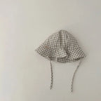 Baby bucket hat by Nova Mart, sunshade fisherman cap for infants and toddlers, featuring lightweight fabric and brim for sun protection.